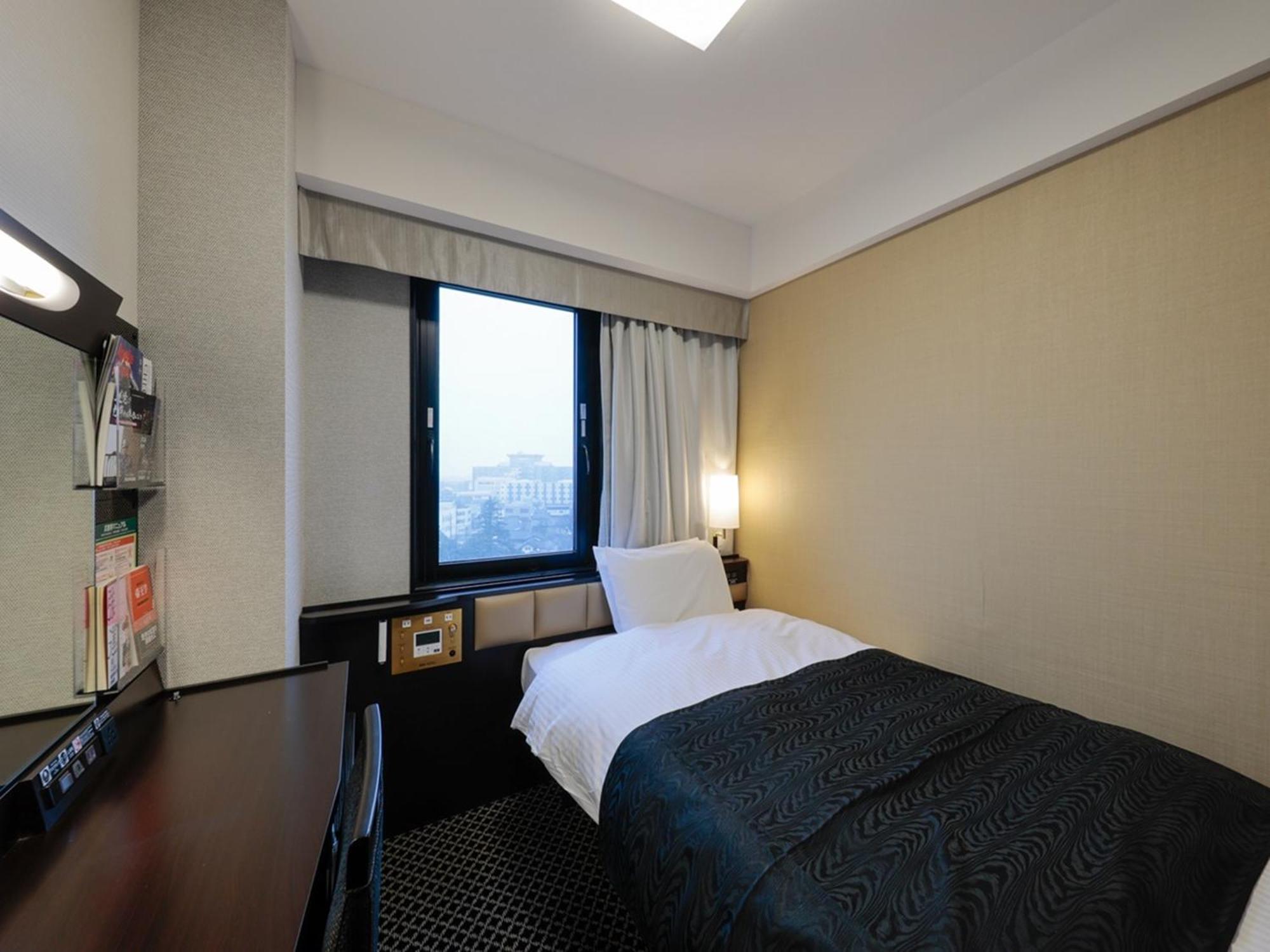 Apa Hotel Tonami Ekimae Extérieur photo